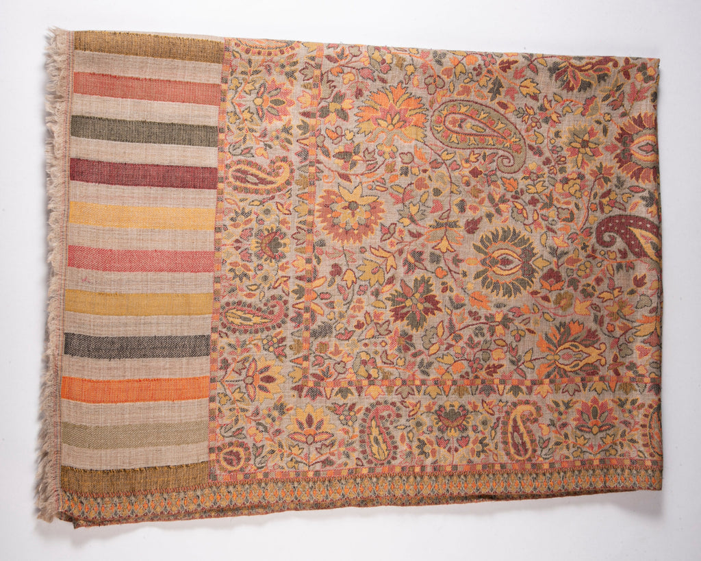 Patterned fabric with paisley design on a white background